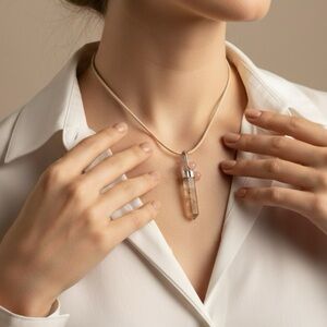 Reticulate Strawberry Quartz Pendant with floral glass and cat eye charm